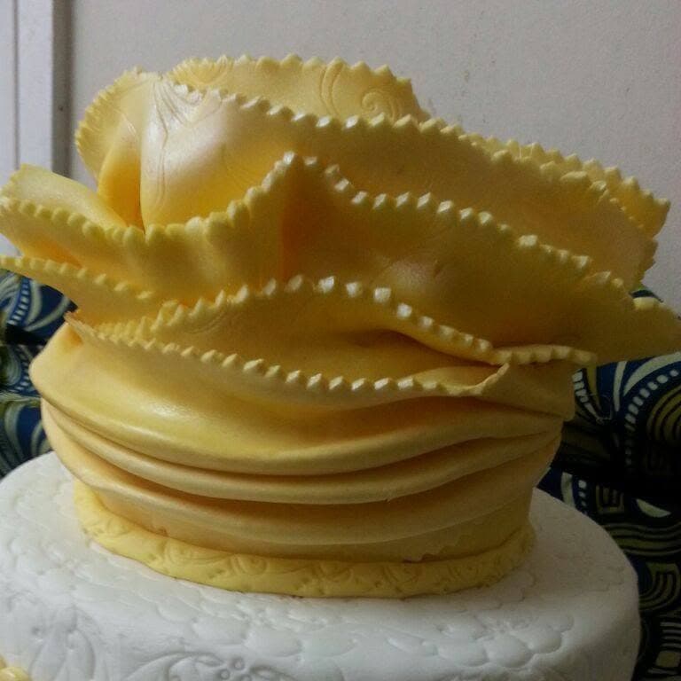 Yellow ruffled fondant cake